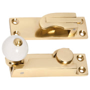 Porcelain Ball Sash Fastener, Polished Brass
